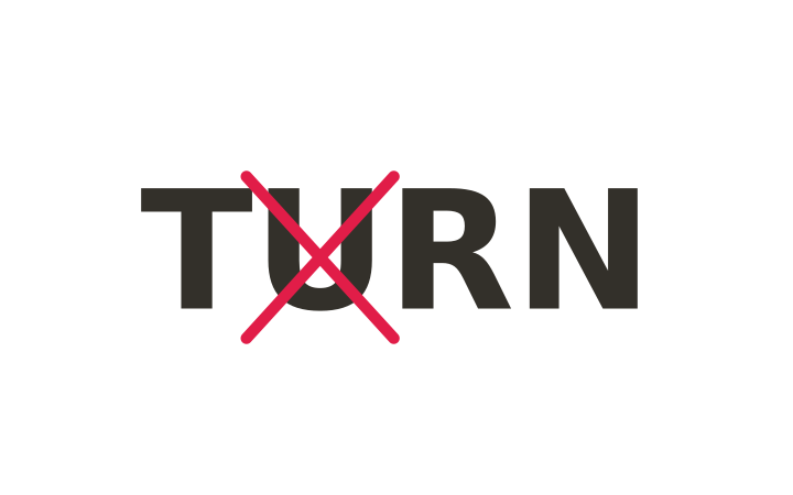 Rebus puzzle: the word TURN with the letter U crossed out in red